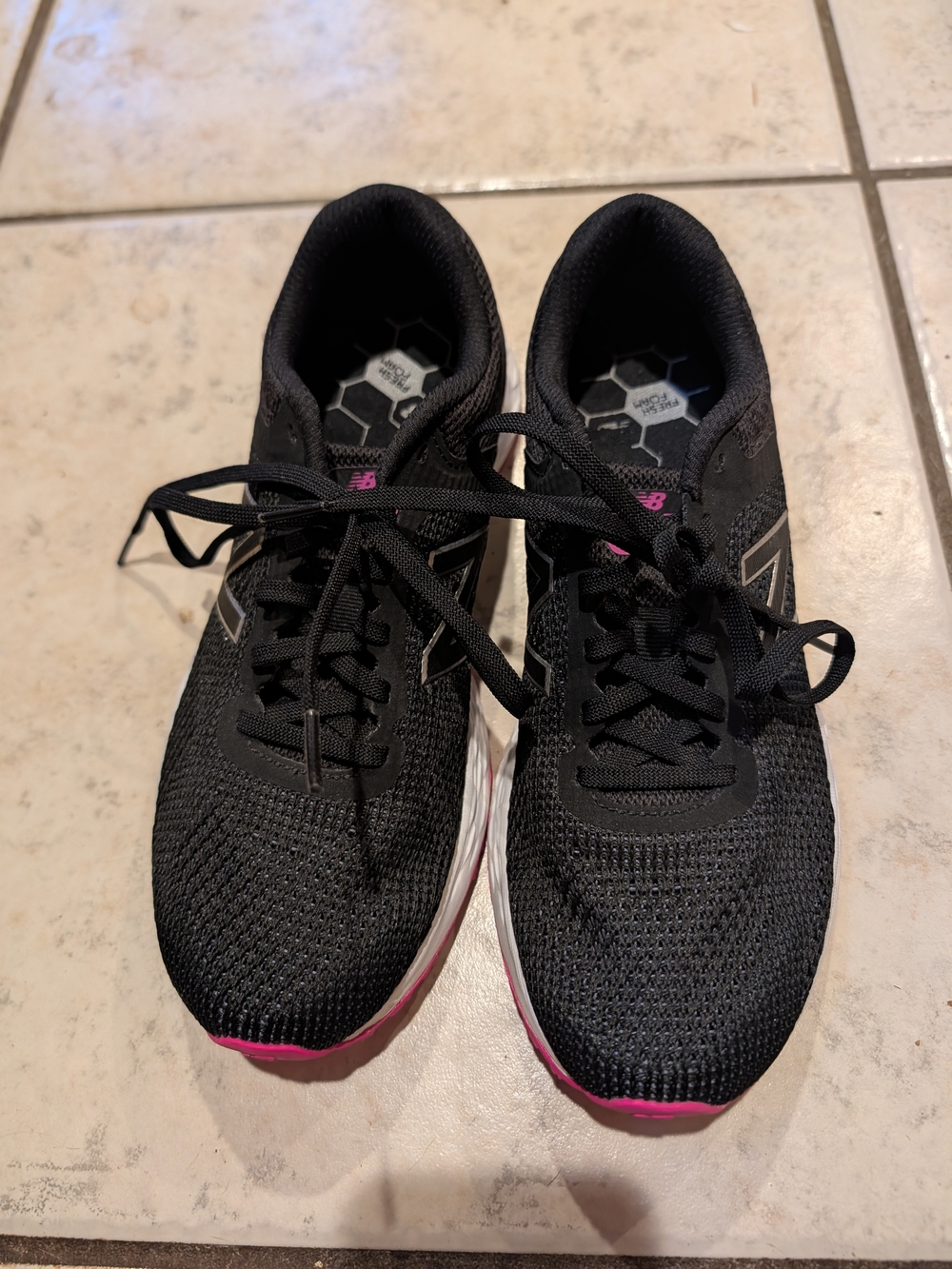 New Balance Women's Black Running Shoes with Pink Accent, Size 8.5